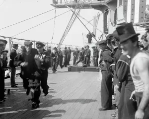 Crewmen Prints: U.S.S. New York, 3 legged race, anniversary of Santiago, 1899 July 3. Creator: Unknown