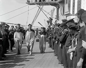 Crewmen Prints: U.S.S. New York, sack race, anniversary of Santiago, 1899 July 3. Creator: Unknown