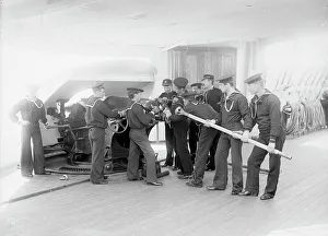 Crewmen Prints: U.S.S. Newark, loading 6-inch gun, between 1891 and 1901. Creator: Unknown