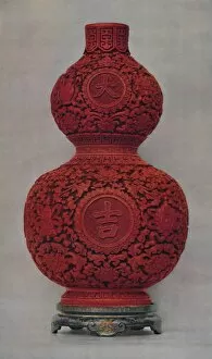 Edward F Strange Gallery: Vase of Carved Red Lacquer on Olive Green Ground with Stand of Flat Lacquer, 1928