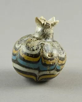 Glass Core Formed Technique Collection: Vase in the Shape of a Pomegranate, Egypt, 1250-1200 BCE. Creator: Unknown