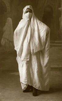 El Djazair Gallery: Veiled woman, Algiers, Algeria, 1943