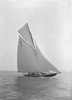 Verbena (H2), a gaff rig 8 Metre, sailing close-hauled, 1911. Creator: Kirk & Sons of Cowes