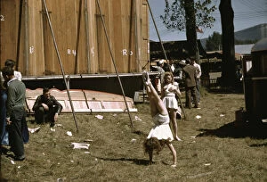 At the Vermont state fair, Rutland, 'backstage'at the 'girlie'show, 1941. Creator: Jack Delano