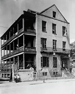Front and side view of apartment(?) house, 61 Washington Street, Charleston, South... c1933 - 1940. Creator: Frances Benjamin Johnston