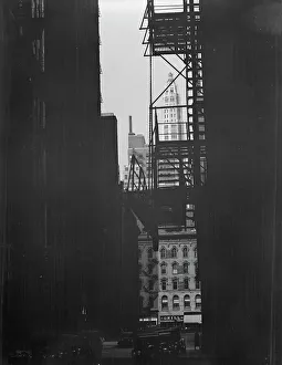 Fire Escape Prints: View between buildings of Mather Building/Tower in distance