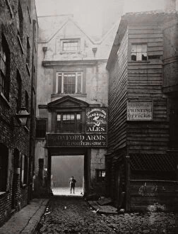 Warwick Lane Gallery: View of the gateway to the Oxford Arms Inn, Warwick Lane, City of London, 1875. Artist