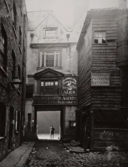 Warwick Lane Gallery: View of the gateway to the Oxford Arms Inn, Warwick Lane, City of London, 1875. Artist