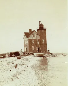 Photographic Prints 1900 1910 Gmgpc Prints: View of lighthouse from beach, Duluth, Minnesota, 1903. Creator: Frances Benjamin Johnston