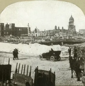 Flour Prints: View from Moulder School distributing station, showing tons of flour on sidewalk, 1906