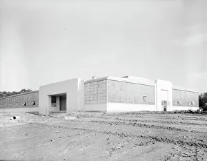 View of nearly completed factory for garment workers, Hightstown, New Jersey, 1936. Creator: Dorothea Lange