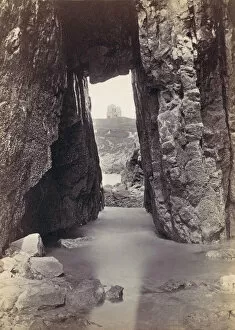 [View Through Rocks Of Tower On Hill], 1870s. Creator: Francis Bedford