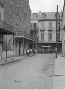 Multi Storey Prints: View down a street, New Orleans, between 1920 and 1926. Creator: Arnold Genthe