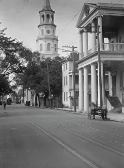 View down street to St. Michael's Church, Charleston, South Carolina, between 1920 and 1926. Creator: Arnold Genthe