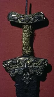 10th Century Gallery: Viking sword with silver and gold hilt, 8th-11th century