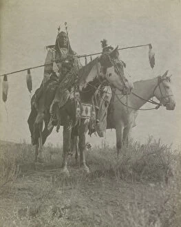 Riders Collection: Village criers on horseback, Bird On the Ground and Forked Iron, Crow Indians, Montana, c1908