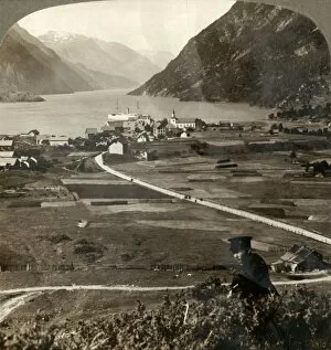 Underwood Travel Library Gallery: Village roofs and sunny fields of Odde, N. up the narrow mountain-walled Sorfjord, Norway, 1905