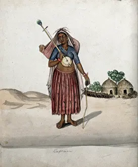 Straw Hut Prints: A village woman carrying a musical instrument in one hand
