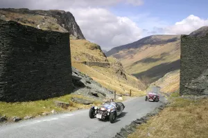 Vintage cars climbing Honister Pass, Lake District, Cumbria