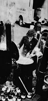 Tinned Food Collection: The W. V. S. Did Many Jobs. Here is a W. V. S. woman managing a field kitchen, c1941 (1942)