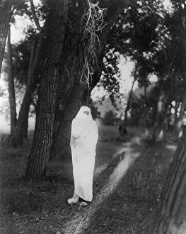Obscured Prints: Waiting in the forest-Cheyenne, c1910. Creator: Edward Sheriff Curtis