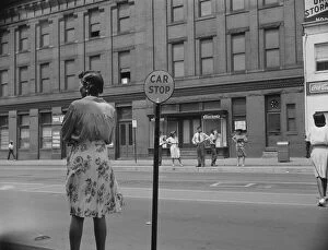 Waiting for the street car at 7th and Florida Avenue, N.W. Washington, D.C. 1942. Creator: Gordon Parks