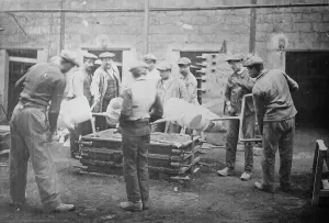 Flat Cap Prints: War Factory, France, between c1915 and 1918. Creator: Bain News Service