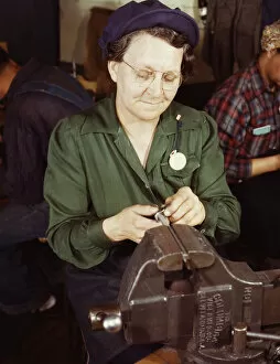 War production worker at the Vilter [Manufacturing] Company making M5...Milwaukee, Wis. , 1943. Creator: Howard Hollem
