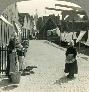 Washday in Volendam, Netherlands - Shoes Large and Small and Some Who Wear Them, c1930s