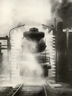 Allen Gallery: Washing A Locomotive on the Canadian National Railway, at Montrea, 1935. Creator: Unknown