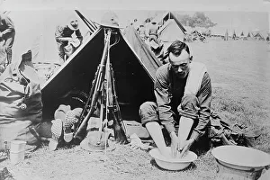 Committee Prints: Washing tired feet, 1918. Creator: Bain News Service