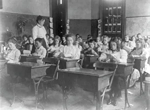 Washington, D.C. public schools, 1st Div. - class making geometric forms with paper, (1899?). Creator: Frances Benjamin Johnston