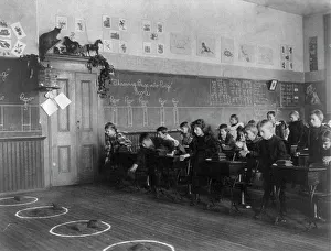 Washington, D.C. public schools - 3rd Division children tossing bean bags in ring, (1899?). Creator: Frances Benjamin Johnston