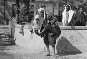 Damascus Prints: A water carrier in Damascus, Syria, c1920s-c1930s(?)