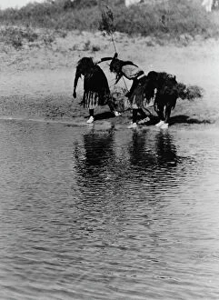 Ceremonial Collection: Water rite purification, Cheyenne animal dance, c1927. Creator: Edward Sheriff Curtis