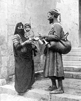 Peoples Of The World In Pictures Gallery: A water seller, Cairo, Egypt, 1936.Artist: Donald McLeish