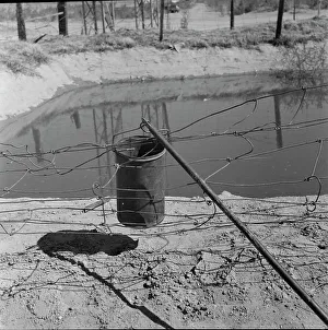 Unsanitary Prints: Water supply, California squatter camp near Calipatria