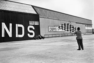 Finishing Line Prints: Waving the chequered flag at Brooklands, 1938 or 1939. Artist: Bill Brunell