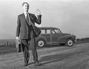 Automotive Prints: Waving Sales rep with a Moris Minor Shooting Brake, 3rd Aug 1963. Artist: Michael Walters