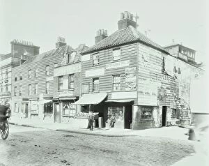 Drug Gallery: Weatherboard houses and shops on the Albert Embankment, Lambeth, London, 1900
