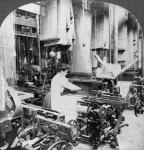 Textile Mill Prints: Weaving linen fabric, Montreal, Canada, early 20th century. Artist: Keystone View Company