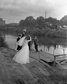 Mexborough Prints: Wedding couple crossing the river Don, Mexborough, South Yorkshire, 1961. Artist