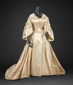 Satin Prints: Wedding Dress (Skirt, Bodice, Peplum, Pair of Gloves), about 1870. Creator: Unknown