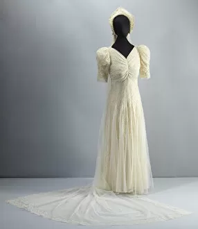 Fashionable Gallery: Wedding dress worn by Lollaretta Pemberton with veil and headpiece, 1939