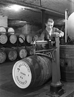 Cask Gallery: Weighing barrels of blended whisky at Wiley & Co, Sheffield, South Yorkshire, 1960