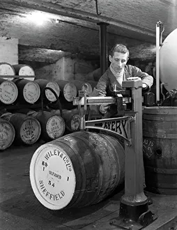 Cask Gallery: Weighing barrels of blended whisky at Wiley & Co, Sheffield, South Yorkshire, 1960