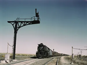 Jacob Ovcharov Prints: West bound Santa Fe R.R. freight train waiting in a siding