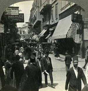 Awning Gallery: West on the Muski, Chief Arabian Thoroughfare of Cairo, Egypt, c1930s. Creator: Unknown