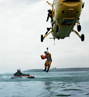Westland Whirlwind helicopter making a rescue, 1973. Artist: Michael Walters