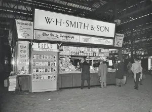 Bookshop Prints: WH Smiths bookstall at Waterloo Station, Lambeth, London, 1960